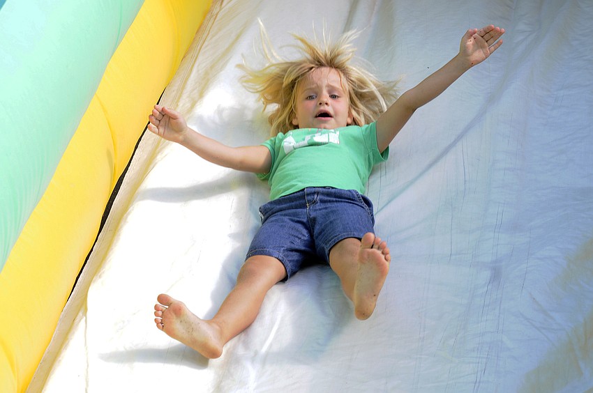 Five-year-old Morgan Meckley made several trips down the slide.