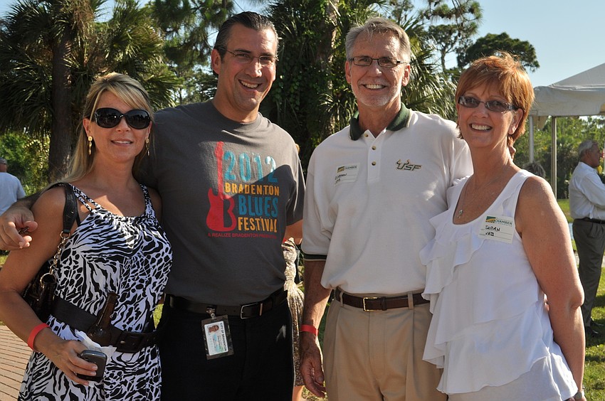 Jeanette Mihailovic and Dave Gustafson, with Bradenton DDA, with Clayton and Sarah Robertson, with VHB
