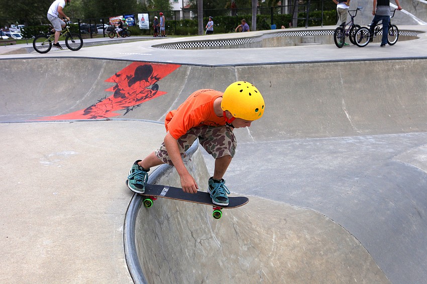 Caleb Abbe, 11, heads into the bowl, Saturday, June 16, at the Skate Park at Payne Park.