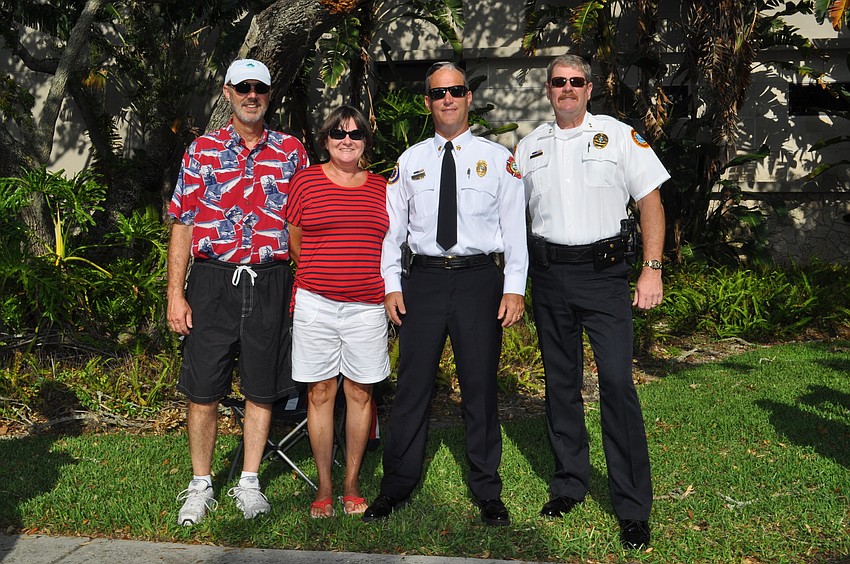Town Manager Dave and Donna Bullock, Longboat Key Fire Rescue Chief Paul Dezzi and Acting Police Chief Pete Cumming