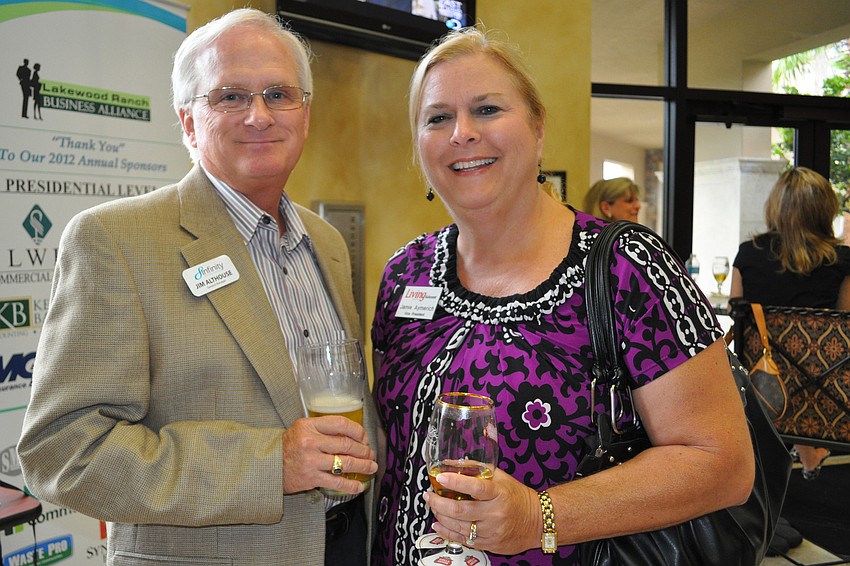 Jim Althourse, of Infinity, with Jamie Aymerich, of Living on the Suncoast