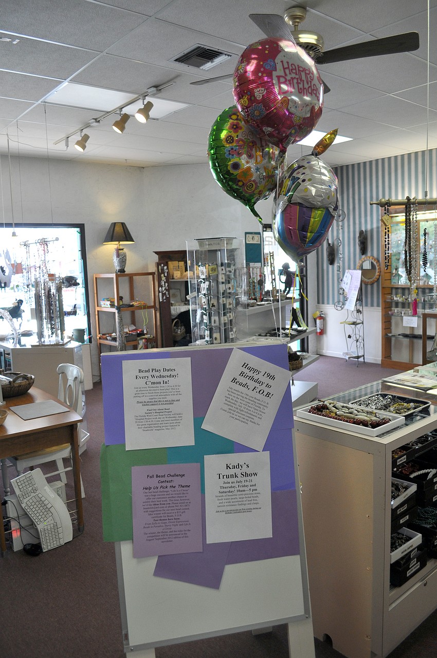 A poster board and balloons decorated the store for the occasion.