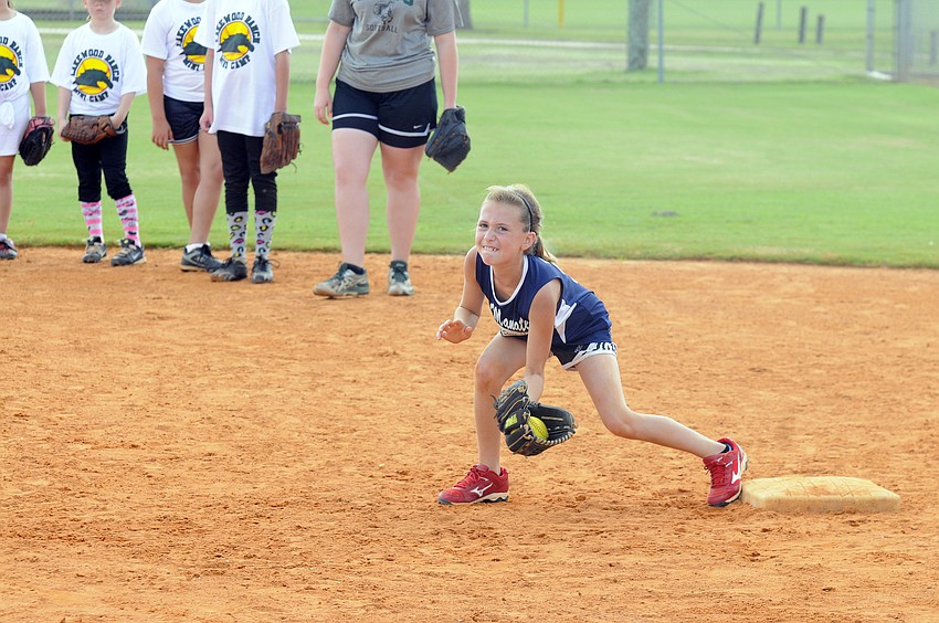 Ten-year-old Kaitlin Yawn, who plays for the Sarasota Heat 02 team, enjoyed participating in the softball camp.