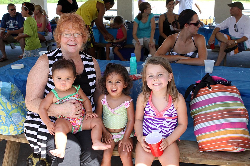 Laura Taylor with Sydney, 9 mos., and Ryleigh, 2, Glass and Olivia Shephard, 5