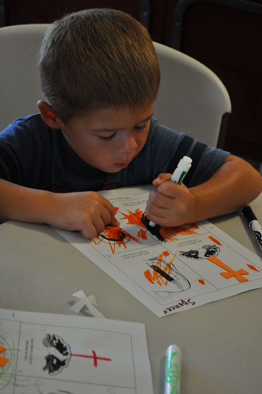 Spencer Winchester, 3, enjoyed coloring.