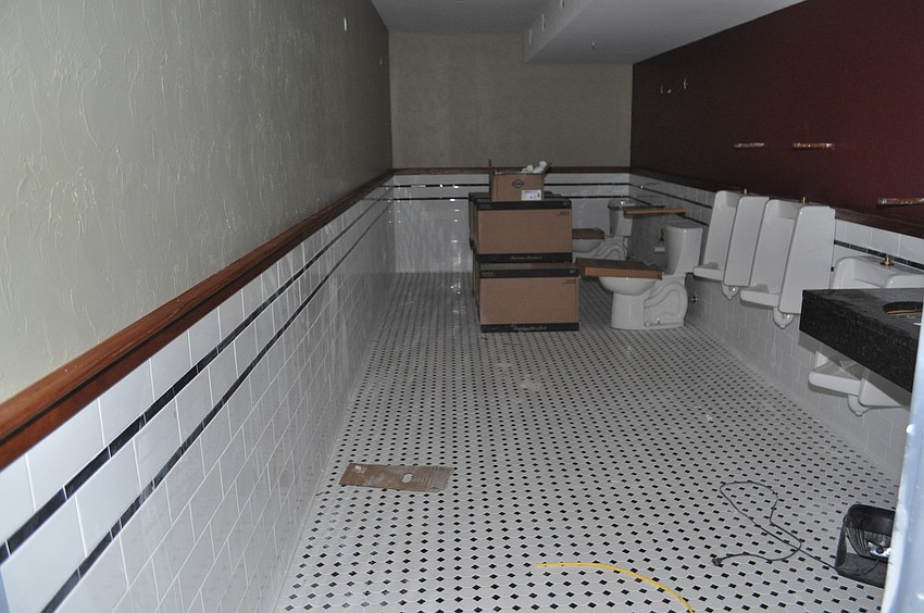 The downstairs men's room has a lot more space than the old one.