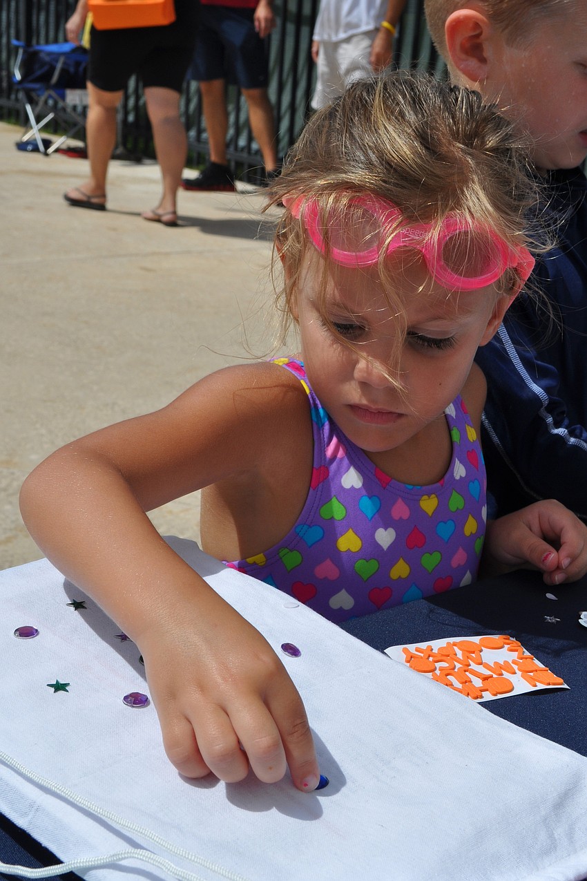 Natalie Fellows, 4, was eager to make her own bag.