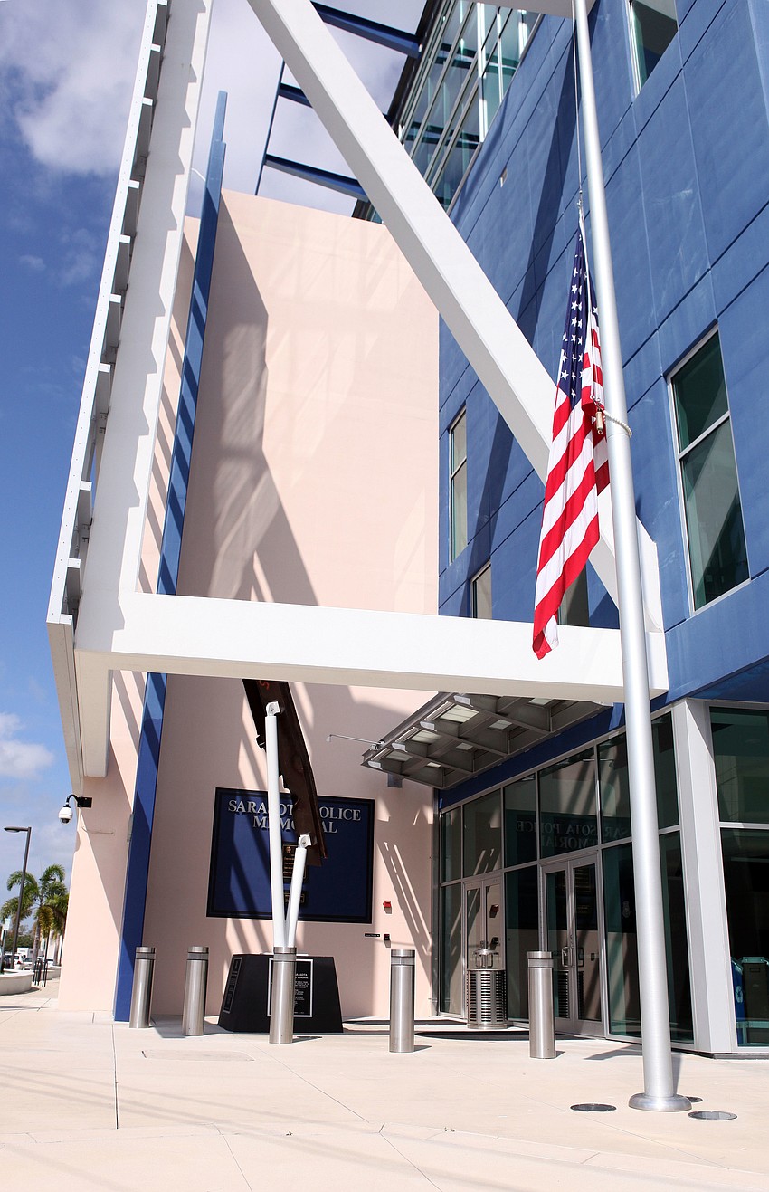 The flag at the Sarasota Police Station by the Sarasota Police Memorial and the Sept. 11 memorial is at half-mast.