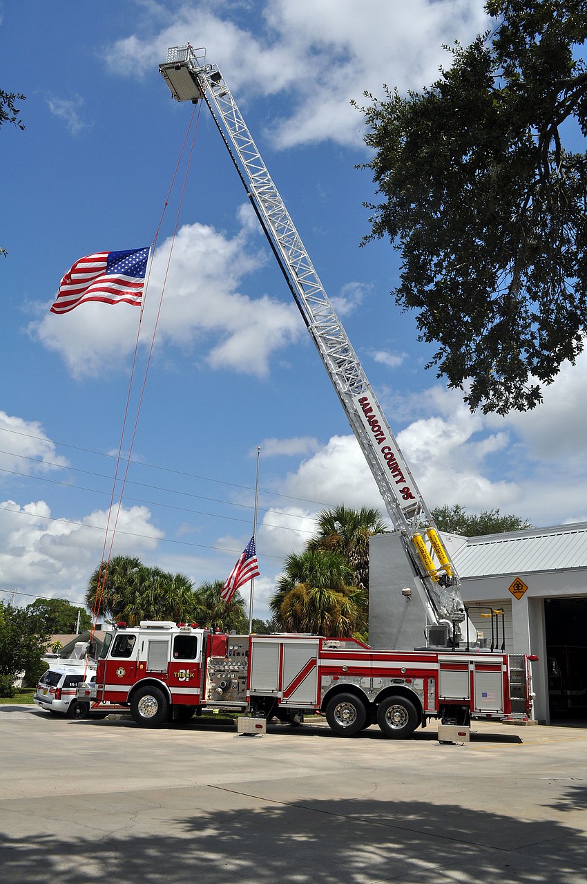 A fire truck outside of Station #2 flew an American during the 9/11 Eleven Year Remembrance Ceremony Tuesday, Sept. 11.