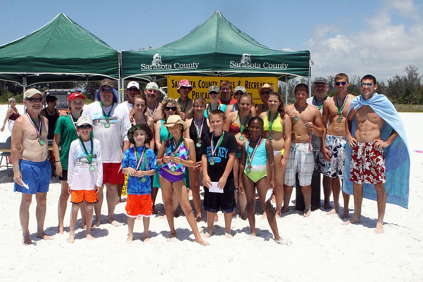 All the winners posed together, Saturday, May 5, after competing in the 40th Annual Sand Sculpting Contest.