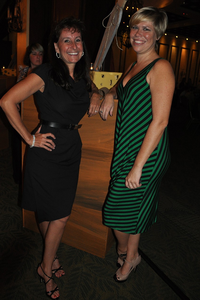Incoming GWiz CEO  Sara Rankin Wilson with outgoing CEO Molly Demeulenaere