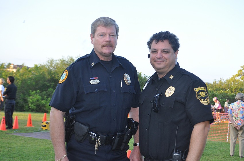 Police Captain Pete Cunning with security Tony D. Grecio