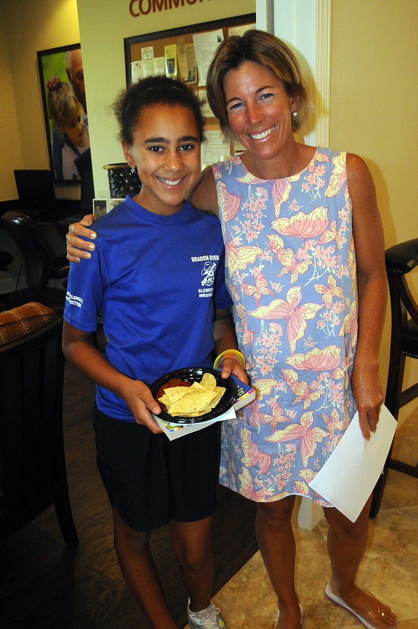 River Club resident Beth Myers and her 11-year-old daughter Lexi have family friends who are going to be moving to Esplanade.