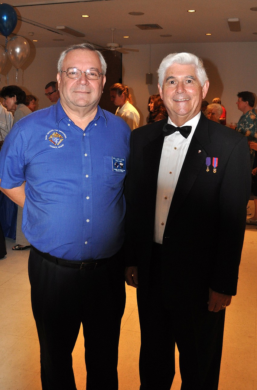 Grand Knight Bill Cook and District Deputy Bob Marrah