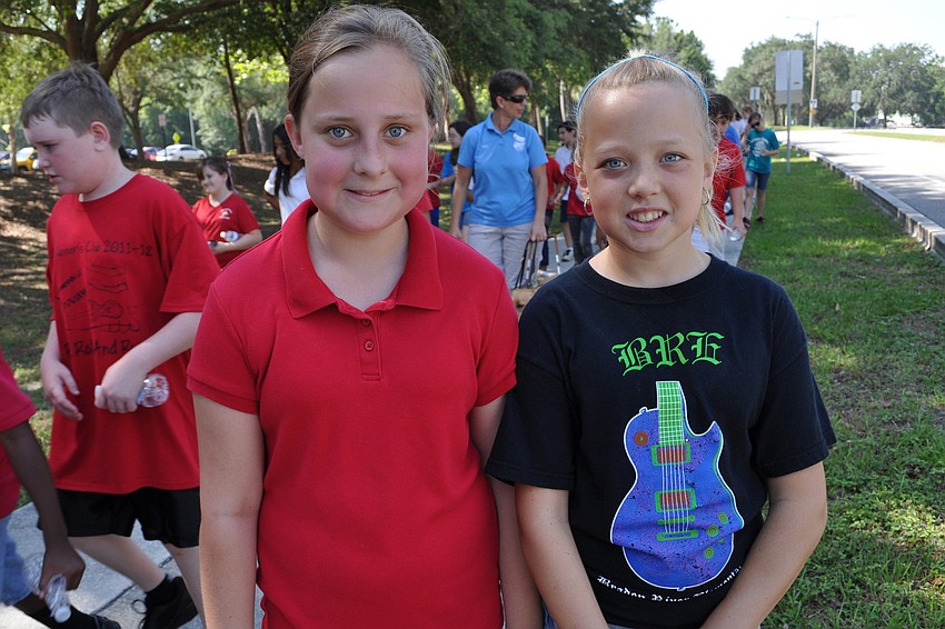 Olivia Reed and Emily Atherton walked together.