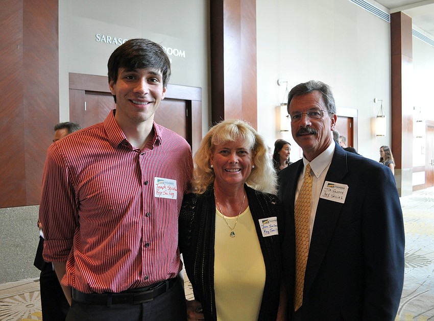 Joseph Strickland, Jan Solomon and Tim Solomon, of Key Sailing, which won the International Business Award.