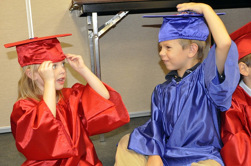Classmates Kylee Tetlow and Sawyer Targosz couldnâ€™t wait to graduate.