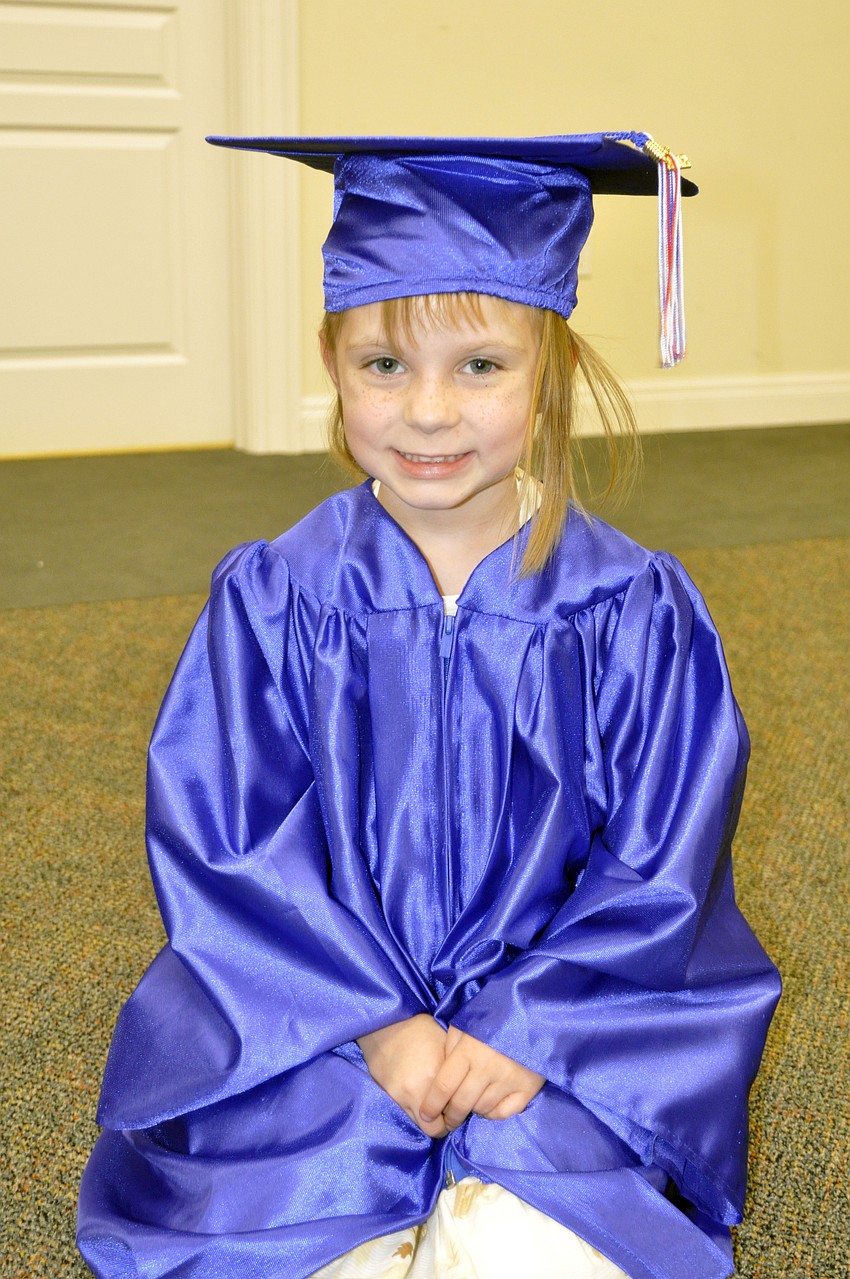 Five-year-old Juliana Anderson couldnâ€™t wait to receive her diploma.