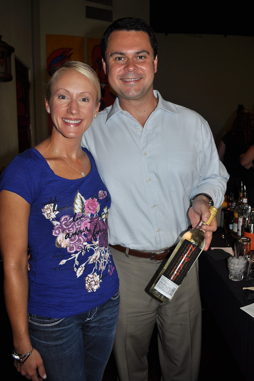 Angela Iwaniw and Paulo Martin were eager to take on the challenge of mixing drinks.