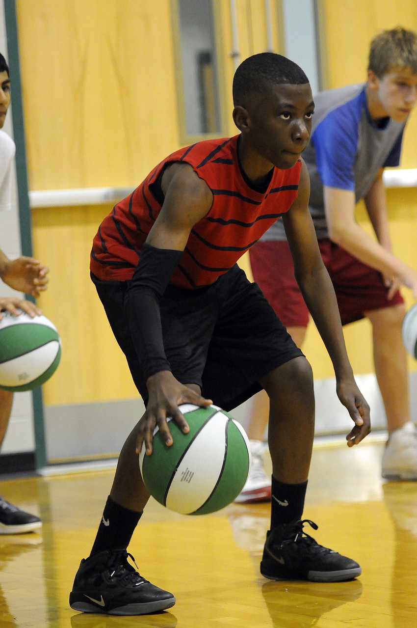 Thirteen-year-old Blauvelt Ross George plays point guard for Braden River Middle School.