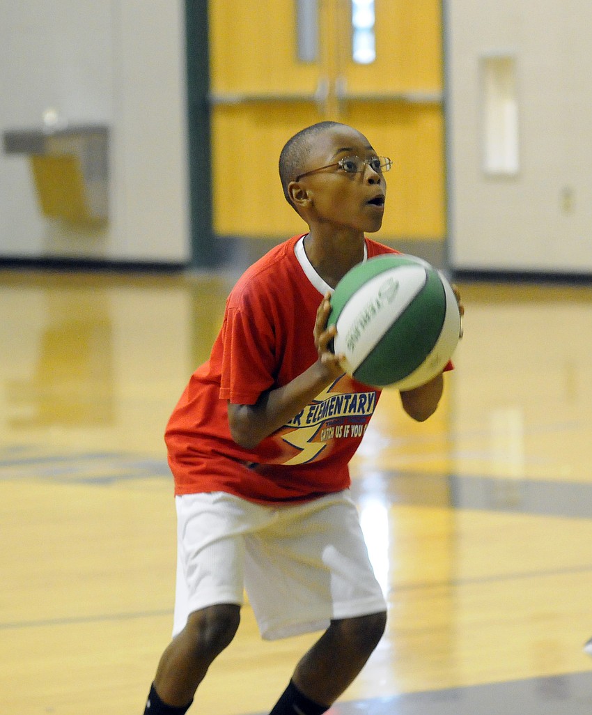 Nine-year-old Sean Roberts made sure to keep his eye on the hoop during knock out.