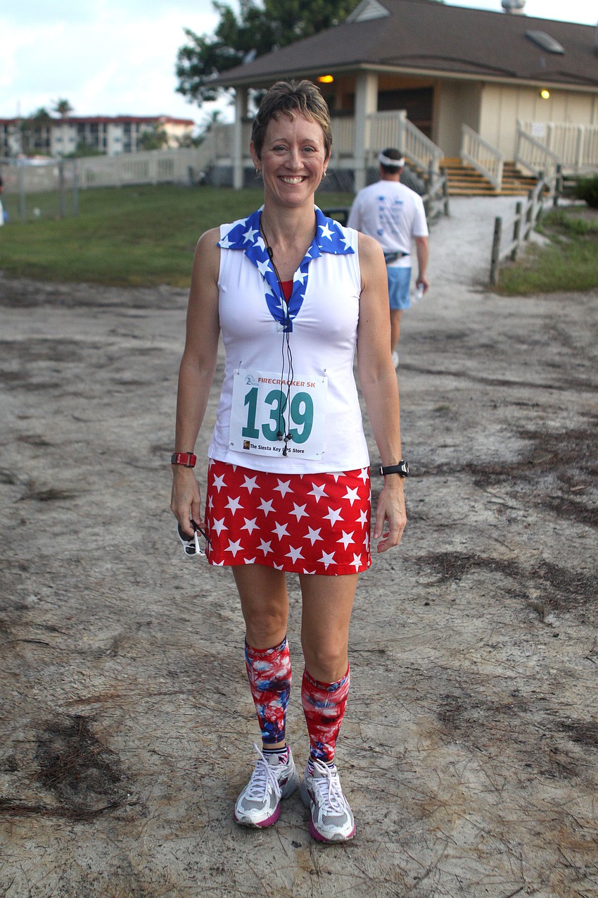 Allison Smith of Myakka City dressed up in red, white and blue for the Firecracker 5K, Saturday, June 30, at Siesta Key Public Beach.