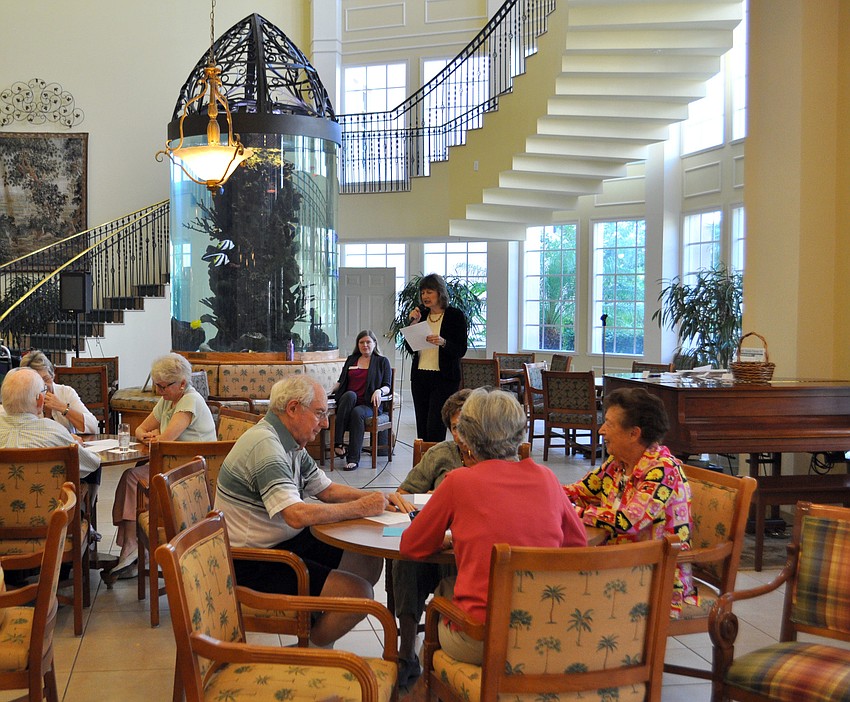 Rennie Carter reads the trivia questions.