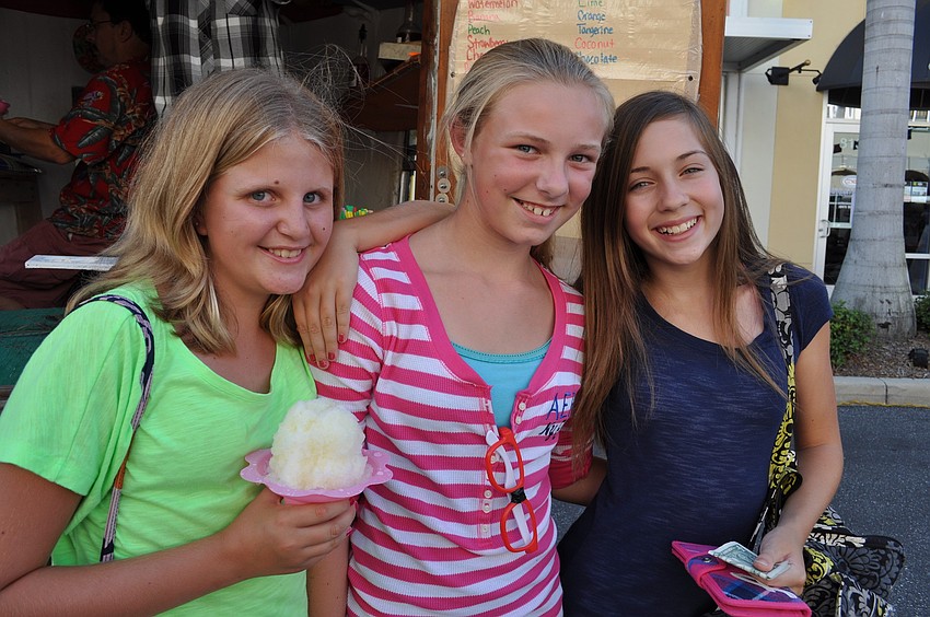 Bridgette Bach, Denver Romano and Caroline Cestaro made sure to get snow cones.