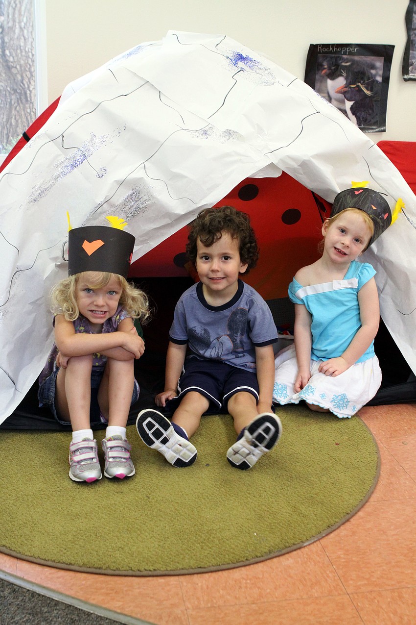 Davina Chait, Adam Bomberger and Macie Miersch hangout in the igloo.