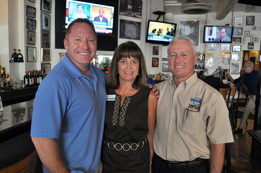 Robert Dinan of Dinan Enterprises, Allie Hueter of Building Connections and John Wojtyna of Aqua Plumbing and Air