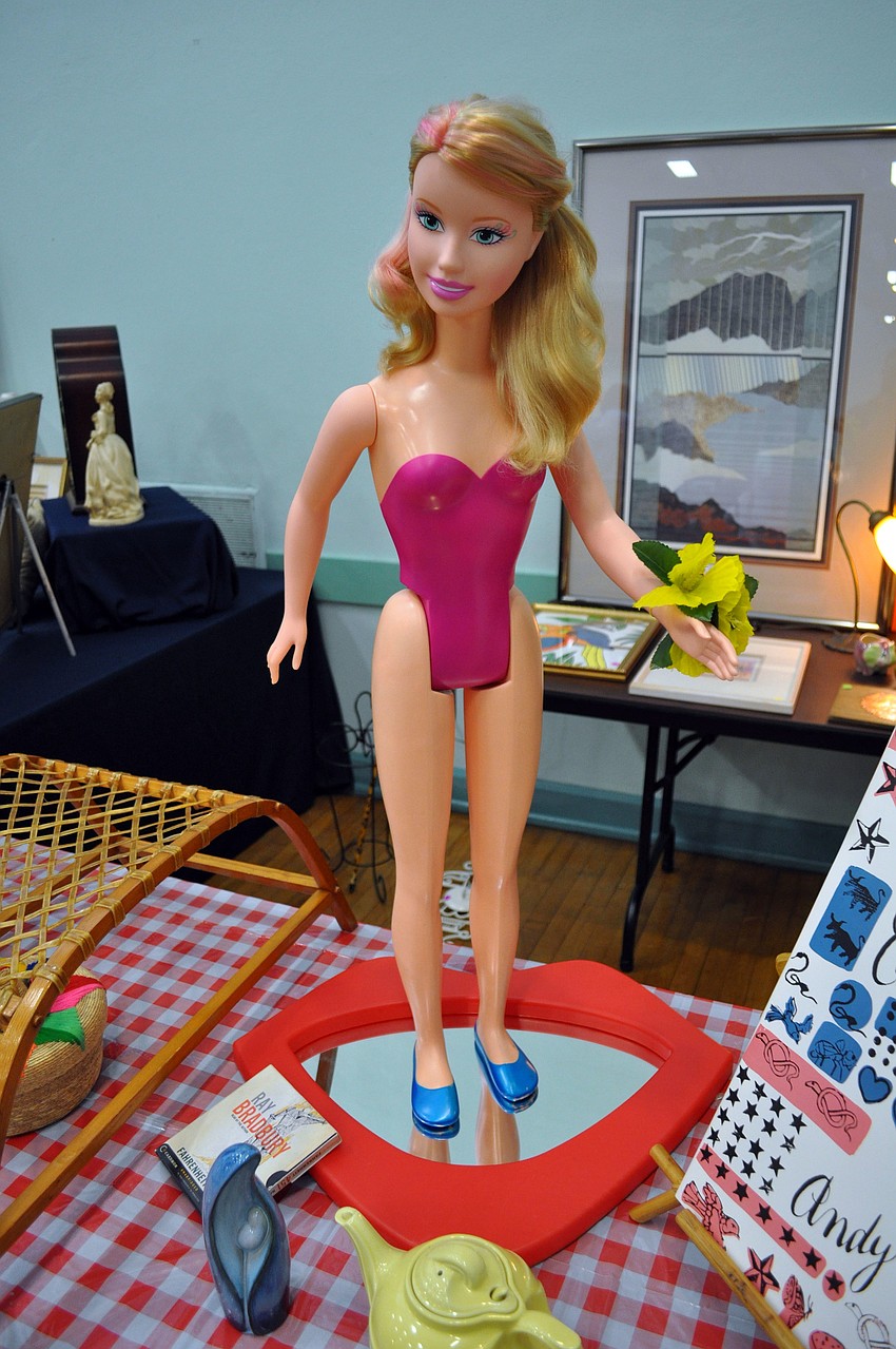 One booth boasted a large Barbie doll.