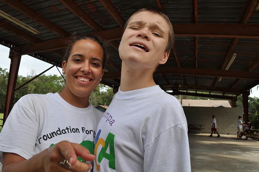 Counselor Elizabeth Napoles grabbed a photo opportunity with camper Danny Woodford.