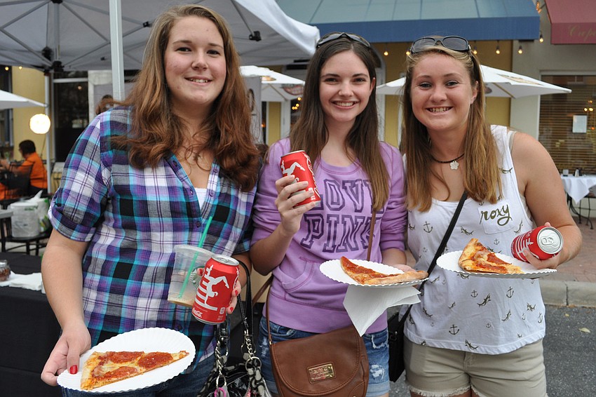 Chelsea Woolman, Tiffany Williams and Shea Fisher grabbed pizza as the evening began.