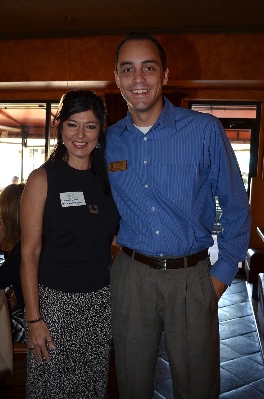 Cynthia Berloni with the Observer Media Group and Kevin Cooper with the Siesta Key Chamber of Commerce