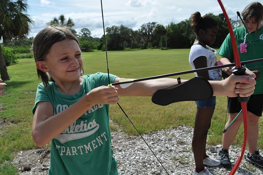 Megan Carley, 11, practiced her archery skills.