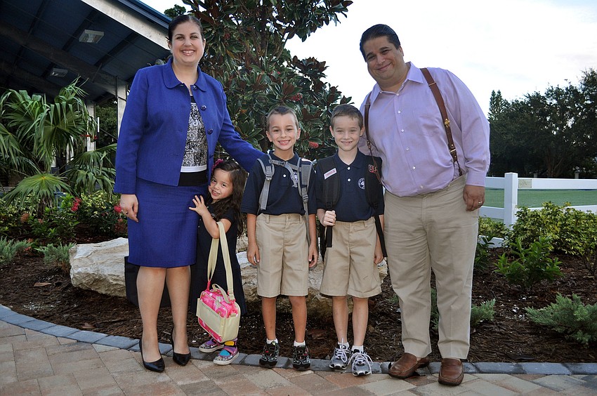 Christine, Madison, 4, Johnny, 7, E.J., 8, and Eric Robinson