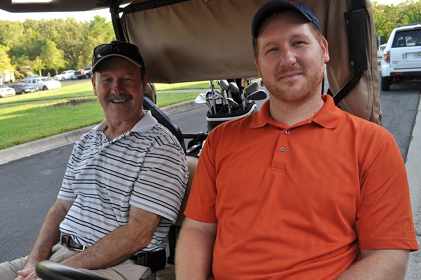 Joe Wolfe golfed with his son, Josh.