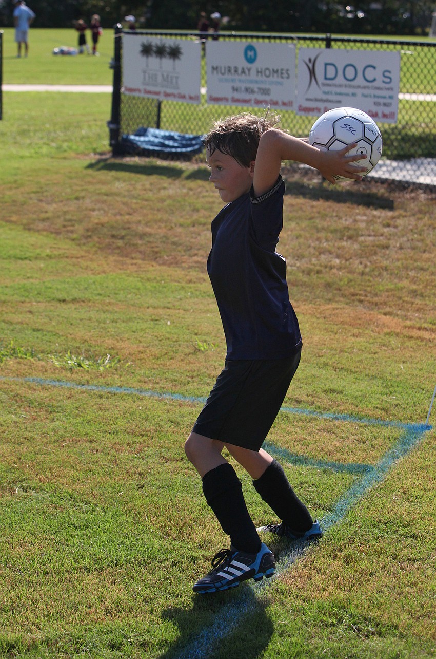 Larsen Carr prepares to throw the ball back onto the field Saturday, Sept. 8 at Glebe Park.