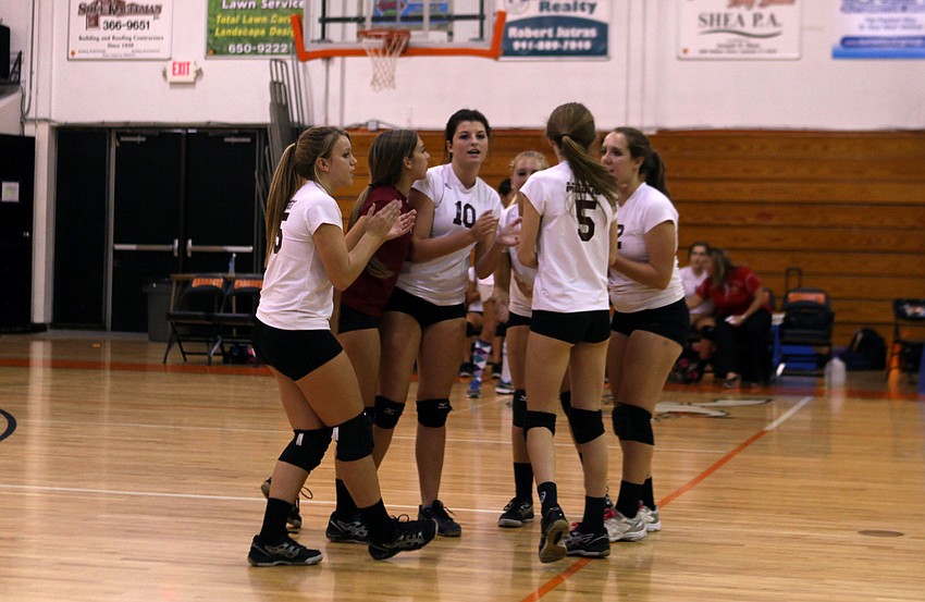 Cardinal Mooney celebrates a point during their game against Sarasota High School Tuesday, Sept. 11 at Sarasota High School.