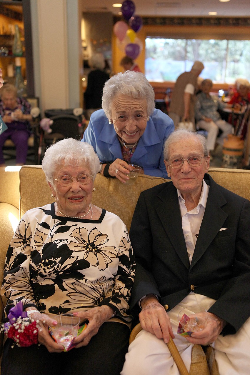 Fay Watkins and Maurice Halpern with their matchmaker, Phyllis Davis.