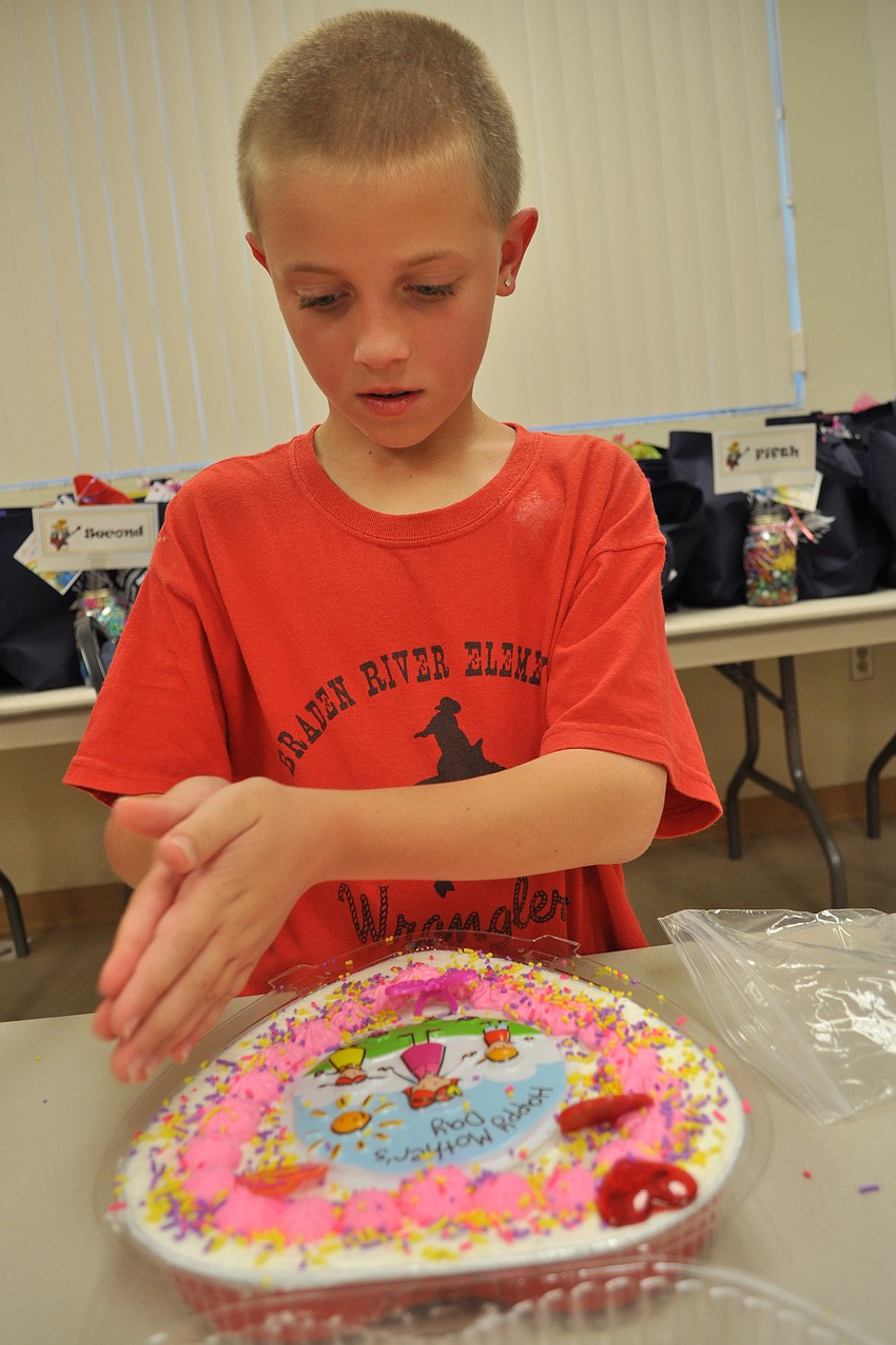 Brenden Kulchar, 9, says he loves his mom because she is funny.