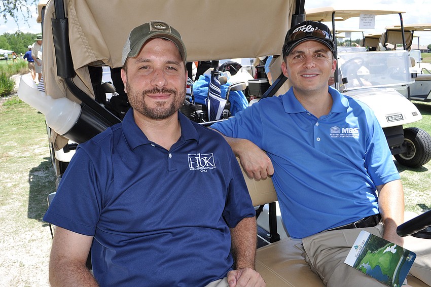Clint Smith and Ryan McIntyre were eager to get on the golf course.