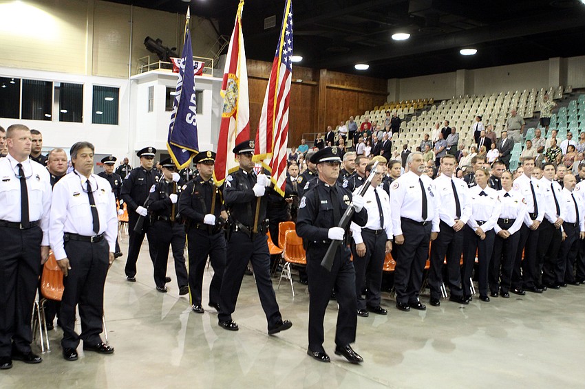 The Color Guard presents the colors during the celebration of life ceremony for Chief Albert Hogle.
