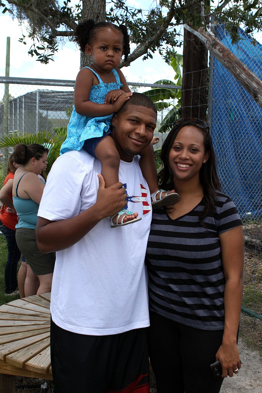 Chris and Shantei Mahone with their daughter, Jayda, 2, enjoy a free day at Big Cat Habitat, Saturday, May 26. Mahone is in the air force.