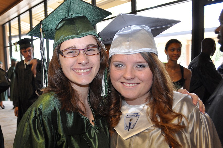 Lakewood Ranch seniors Cassandra Schwartzkopf and Taylor Shearer were all smiles while preparing for their graduation ceremony.
