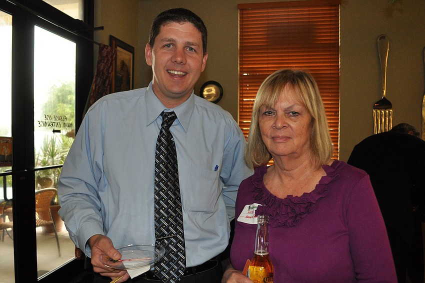 Greg Poznanski, of SunTrust, with Helen Daruszka, of Arcade Painting