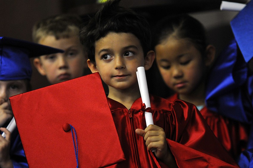Five-year-old Jake Morales was one of the first graduates to receive his diploma.