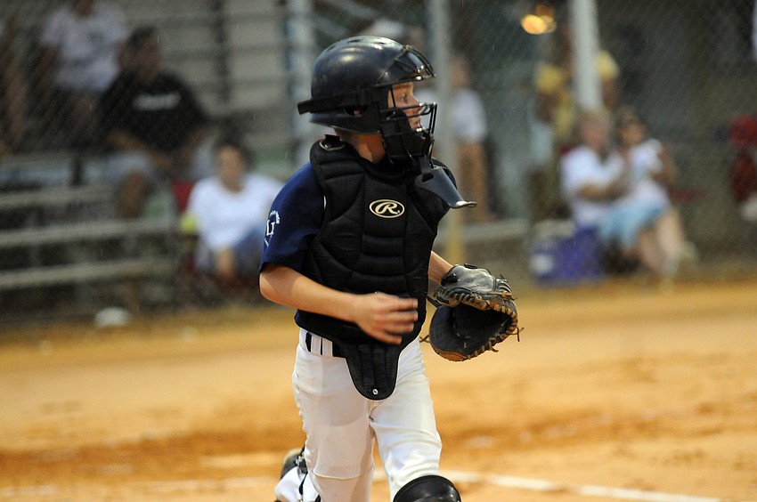 Ten-year-old Xander Smith played catcher for Big League Experience.
