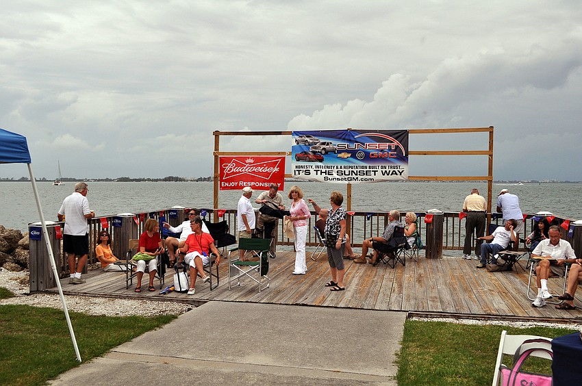 Many people placed blankets and chairs on the wooden dock area during Friday Fest.