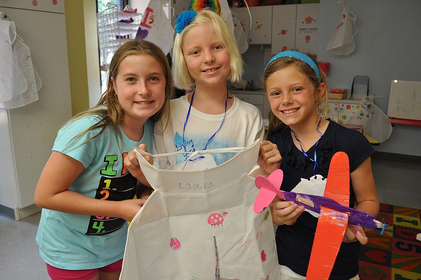 Charlotte Edmond, Laura Swartzendruber and Hallie Monserez enjoyed craft time together.